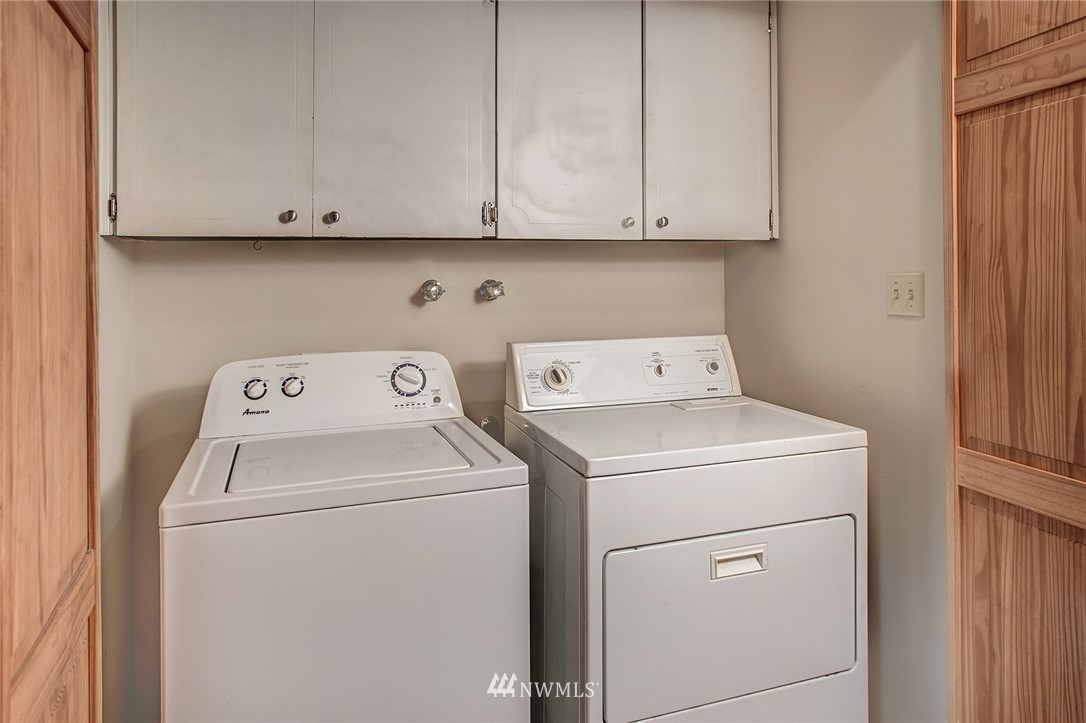 14437 157th Place Southeast Renton, WA 98059 - Photo 18 of 18 a utility room with dryer and washer