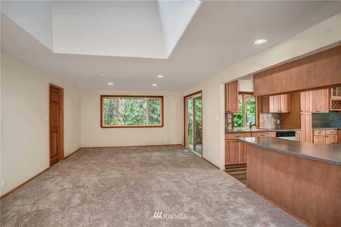 14437 157th Place Southeast Renton, WA 98059 - Photo 3 of 18 an empty room with windows