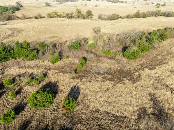 a view of a lake with beach