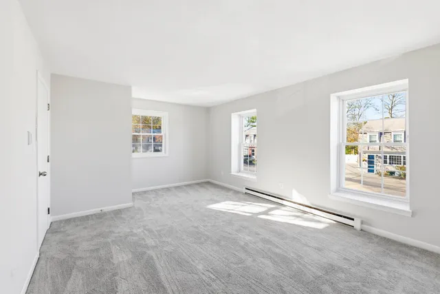 an empty room with windows