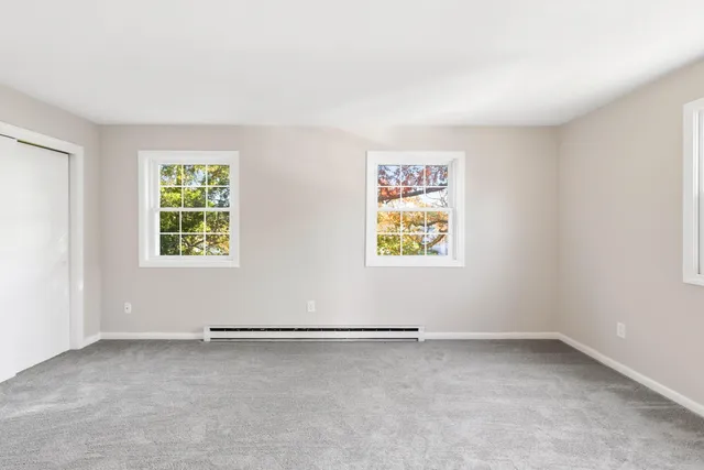 an empty room with windows