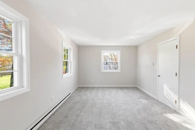 an empty room with windows