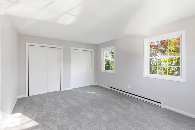 an empty room with windows