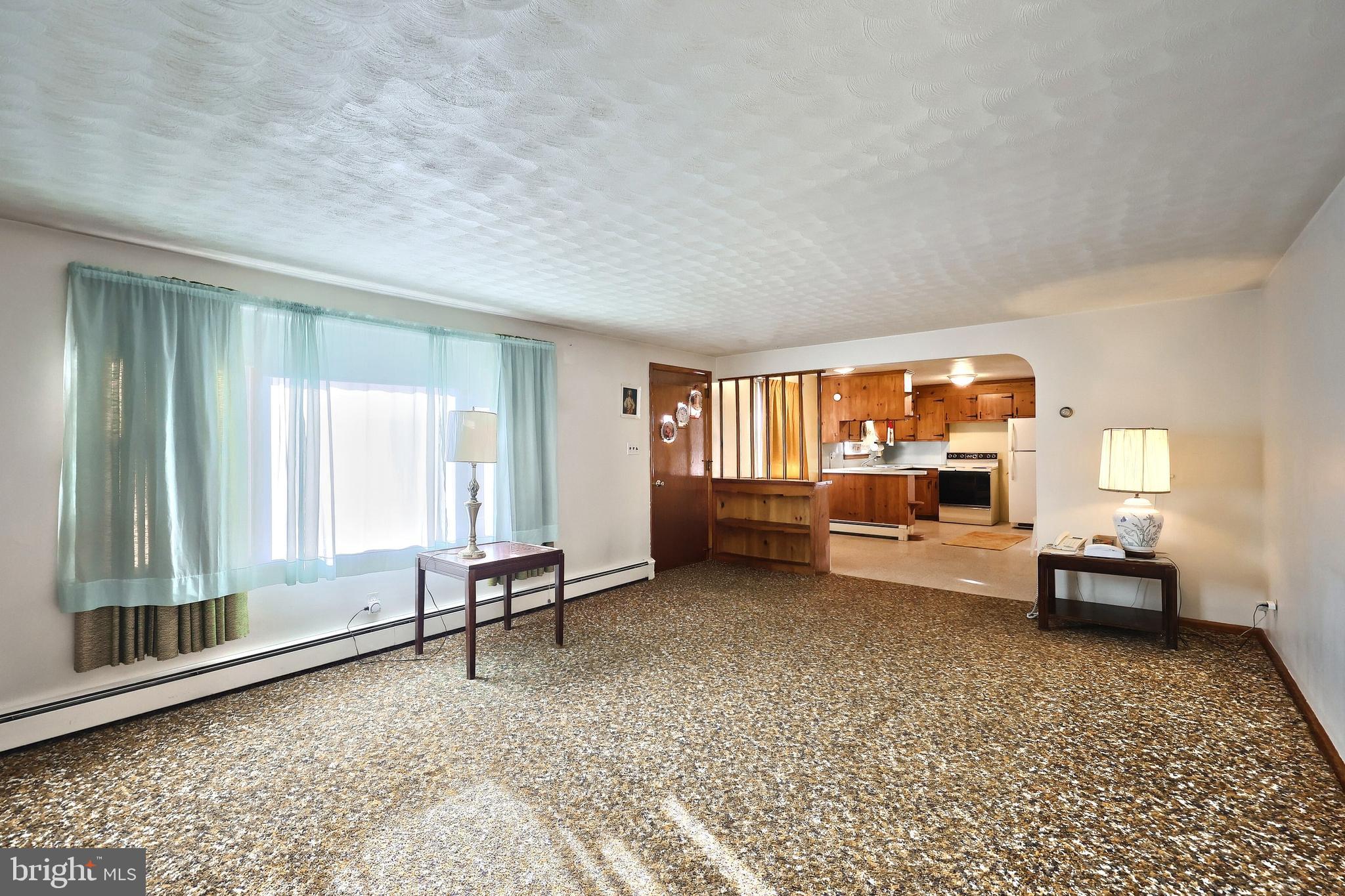 1365 Burkholder Road Red Lion, PA 17356 - Photo 17 of 34 a living room with furniture and a window