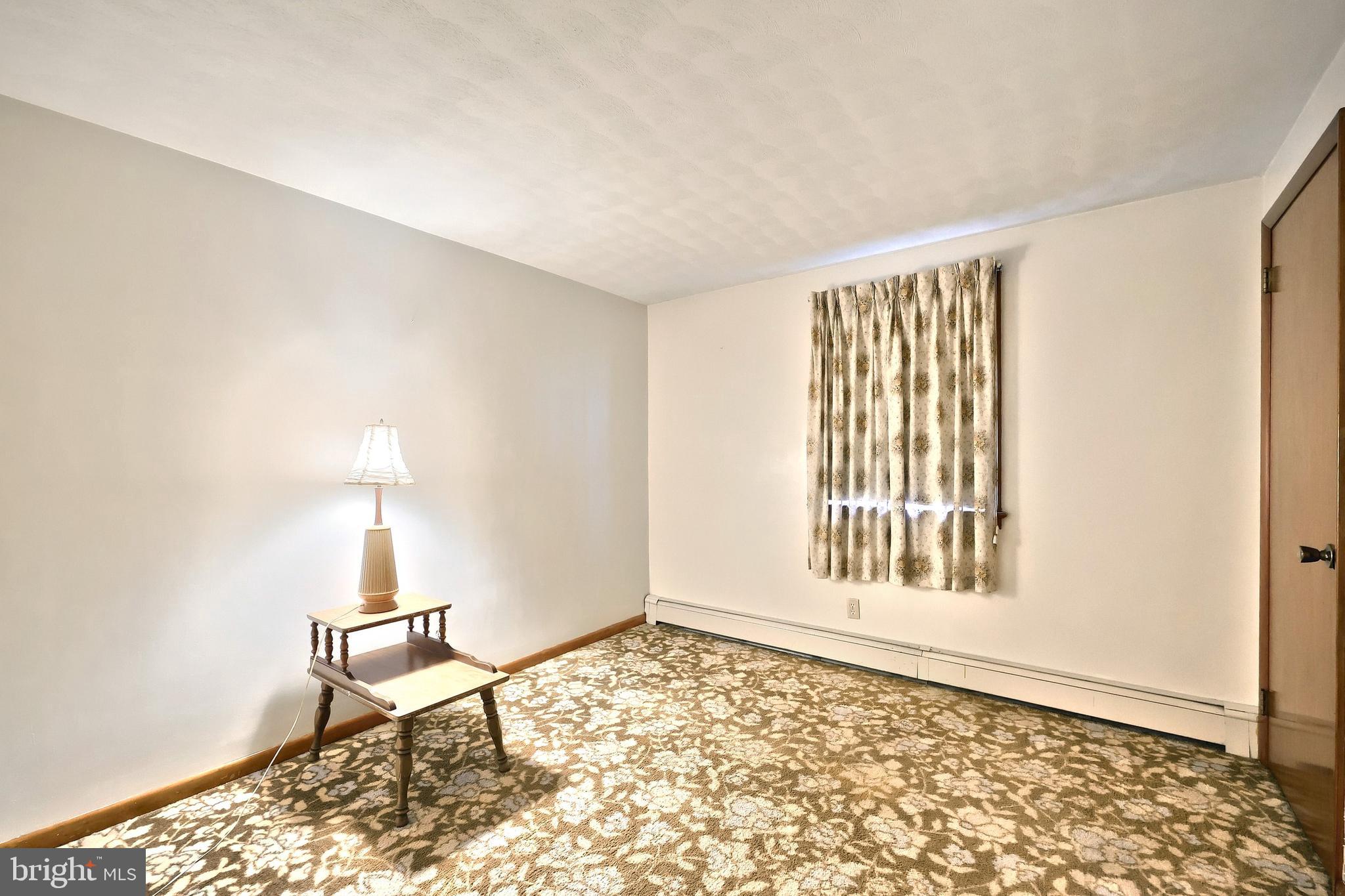 1365 Burkholder Road Red Lion, PA 17356 - Photo 23 of 34 a view of an empty room with a window