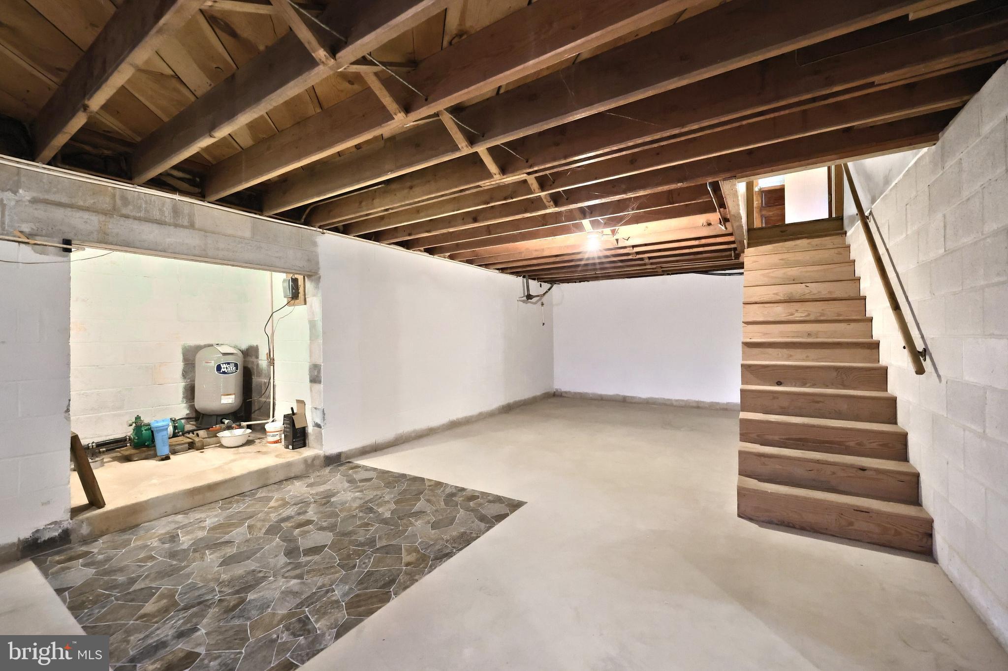 1365 Burkholder Road Red Lion, PA 17356 - Photo 31 of 34 a view of a hallway with wooden floor and staircase