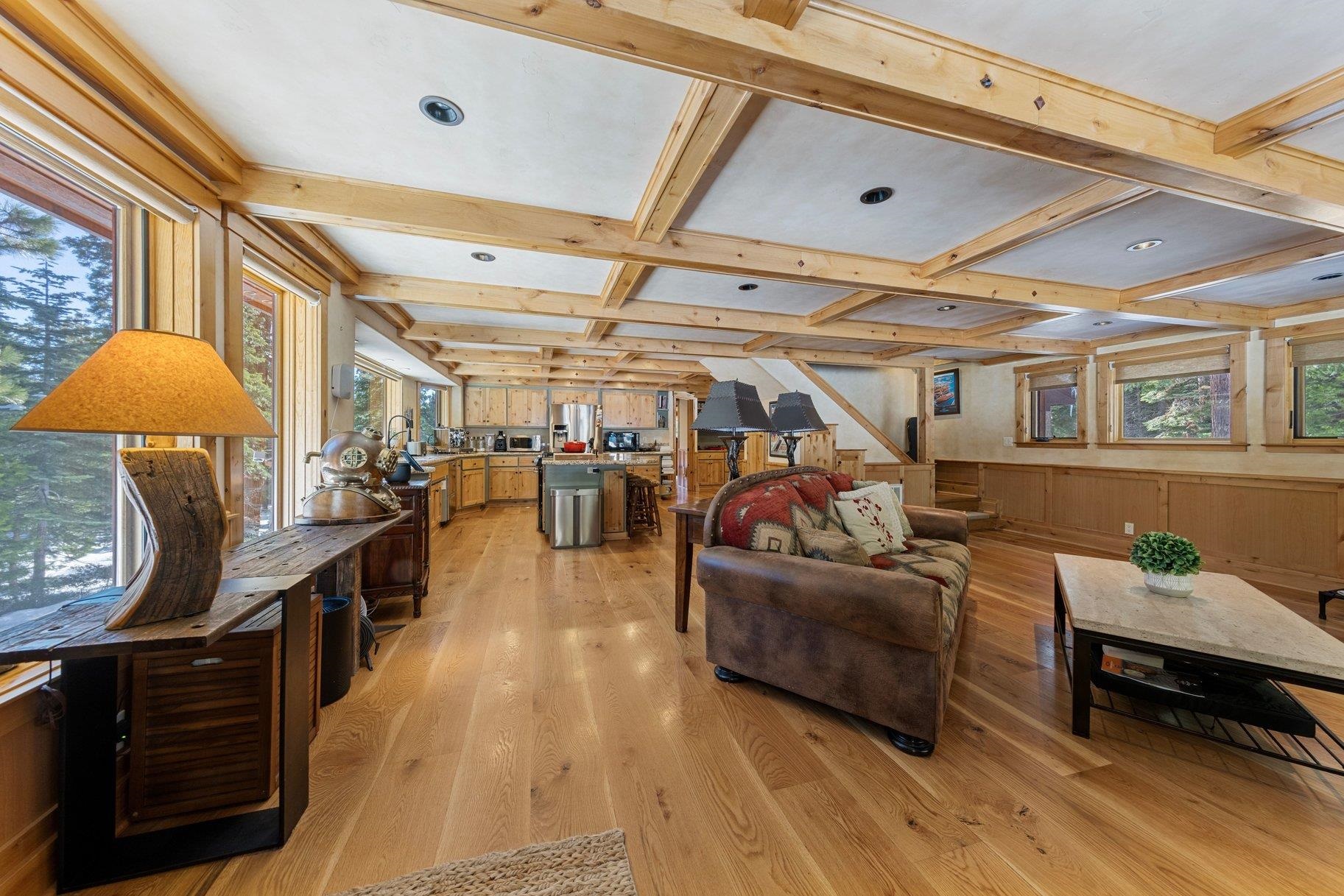 6442 Donner Road Tahoe Vista, CA 96148 - Photo 4 of 28 a living room with furniture and a potted plant