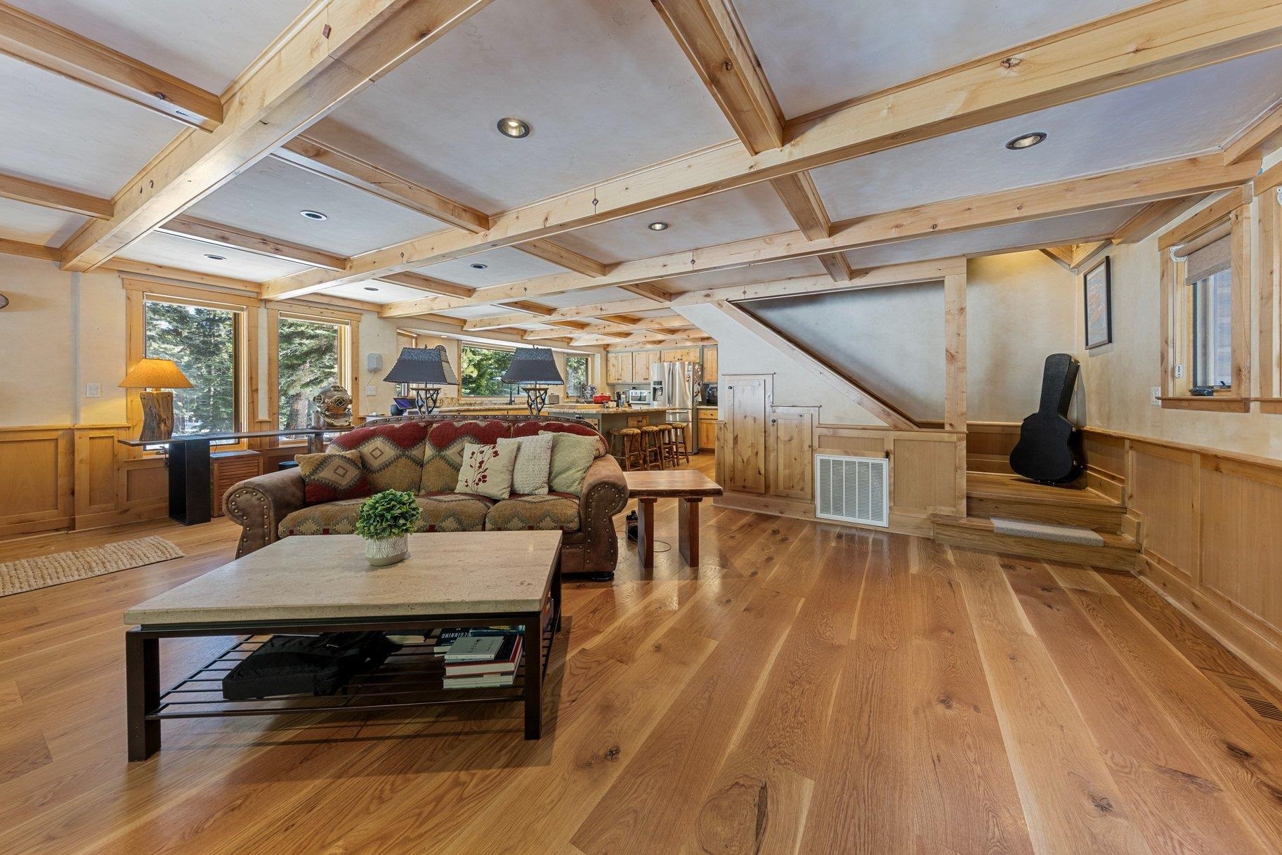 6442 Donner Road Tahoe Vista, CA 96148 - Photo 8 of 28 a living room with lots of furniture and wooden floor