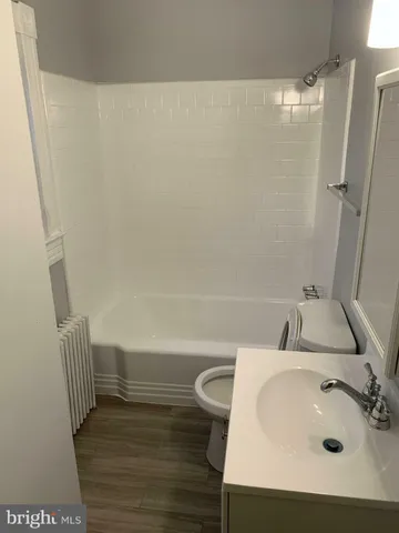 a bathroom with a sink and a tub