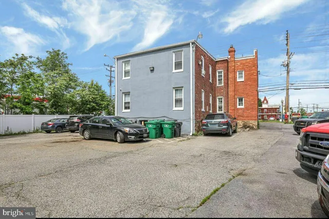 a view of a street with cars