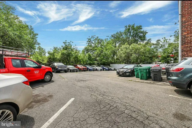 a view of a street with cars