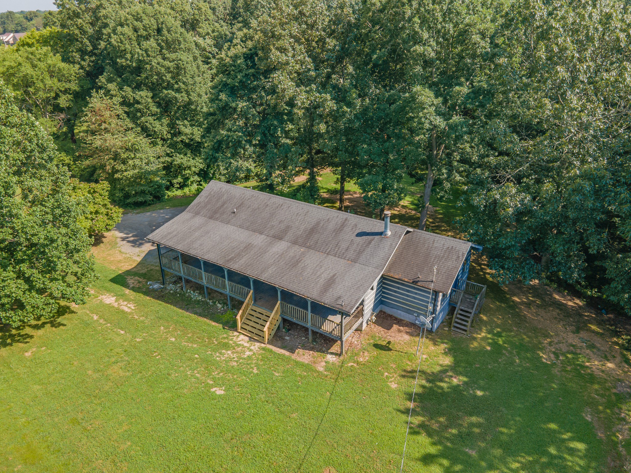 2151 Maysville Road Dickson, TN 37055 - Photo 12 of 98 an aerial view of a house with swimming pool