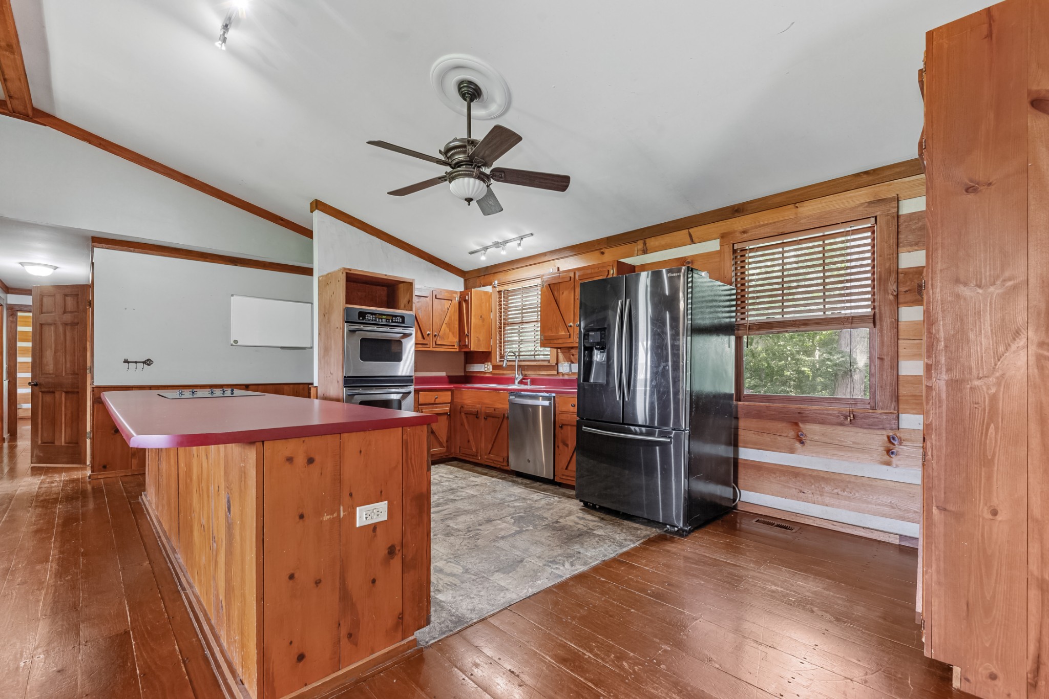 2151 Maysville Road Dickson, TN 37055 - Photo 43 of 98 a view of a kitchen with wooden floor and electronic appliances