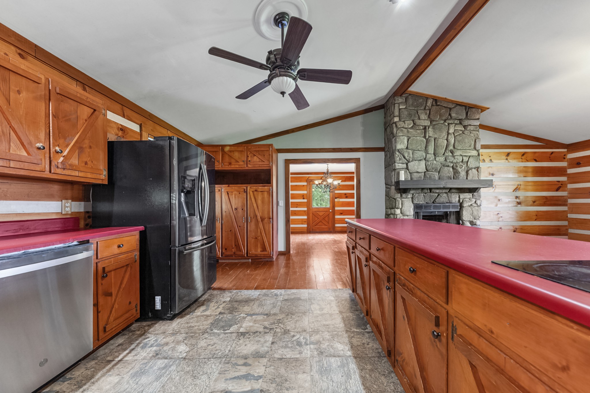 2151 Maysville Road Dickson, TN 37055 - Photo 46 of 98 a kitchen with stainless steel appliances granite countertop a refrigerator a stove and a sink with wooden cabinets