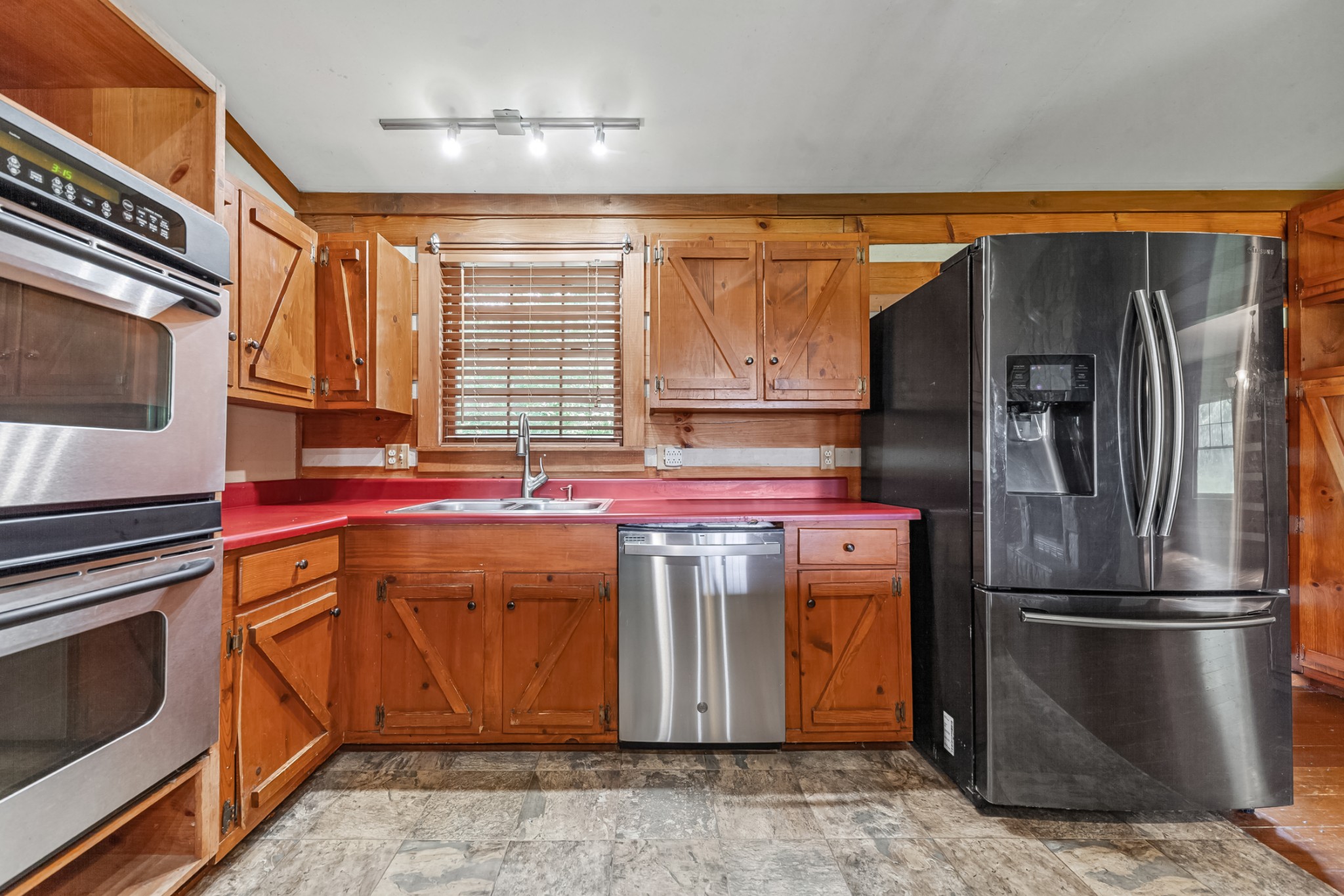 2151 Maysville Road Dickson, TN 37055 - Photo 47 of 98 a kitchen with stainless steel appliances granite countertop a refrigerator and a stove
