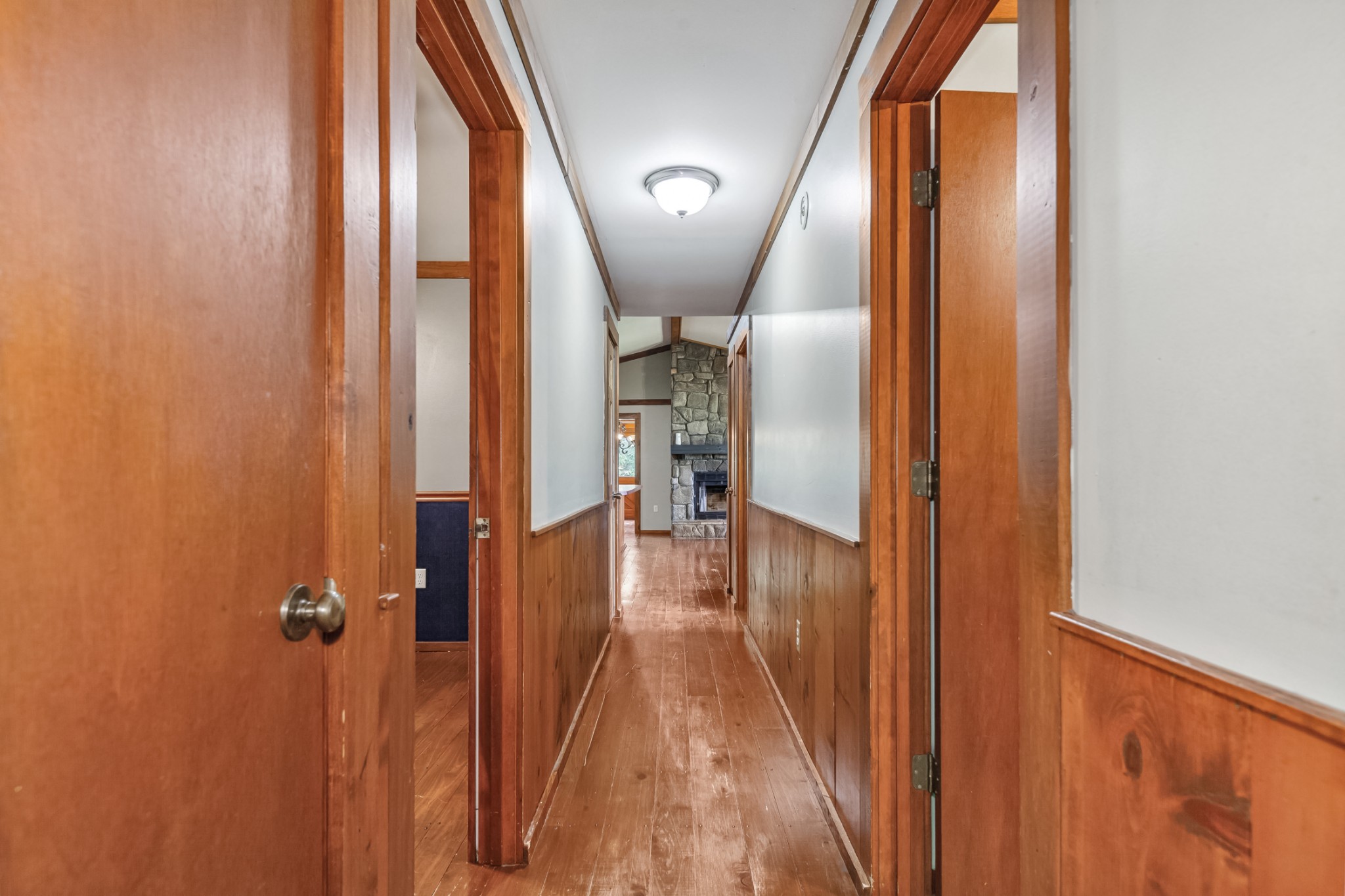 2151 Maysville Road Dickson, TN 37055 - Photo 58 of 98 a view of a hallway with wooden floor and staircase