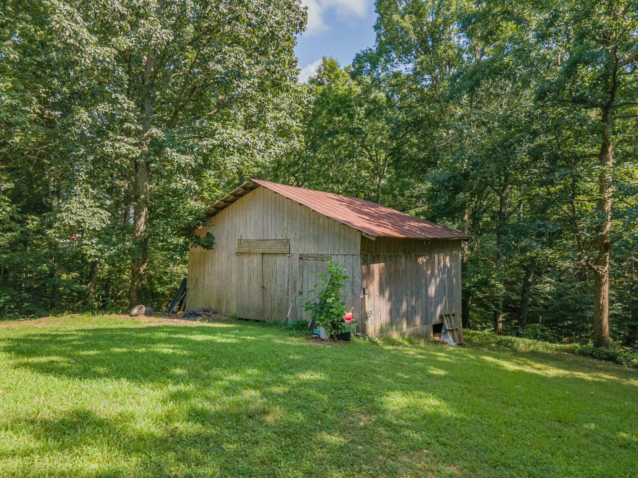 2151 Maysville Road Dickson, TN 37055 - Photo 90 of 98 a backyard of a house with lots of green space