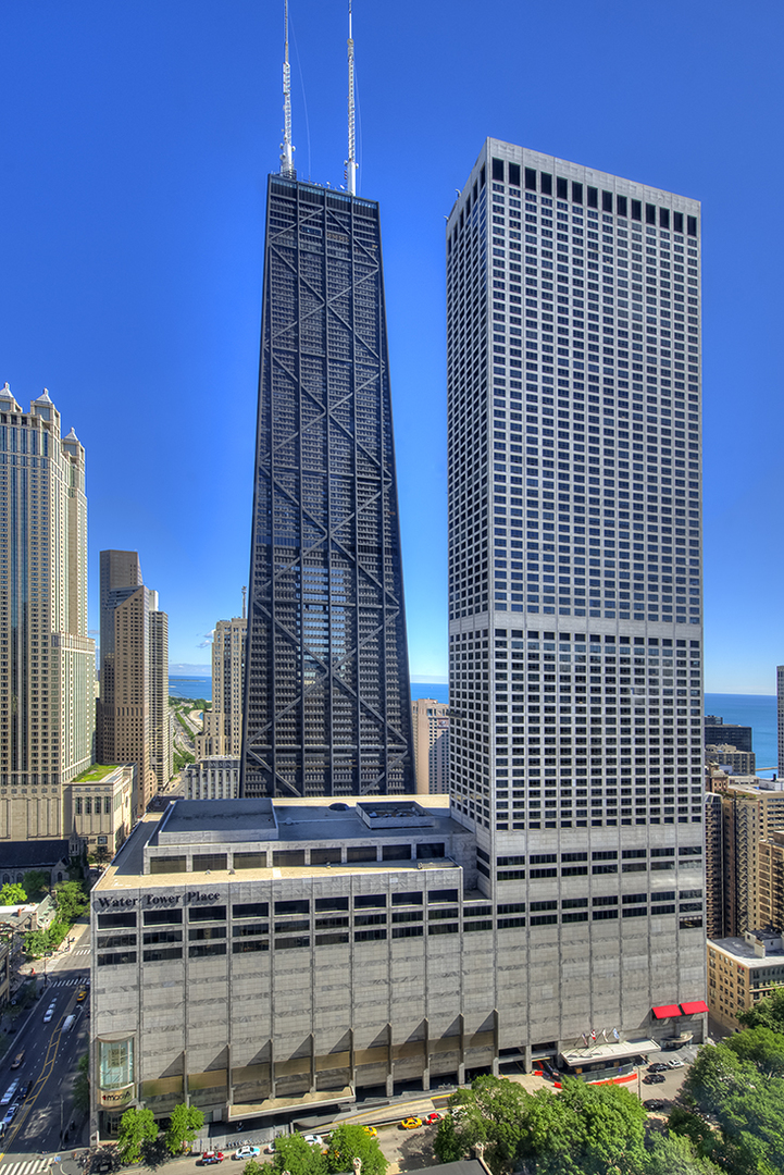 180 East Pearson Street, Unit 4002 Chicago, IL 60611 - Photo 1 of 40 a front view of a building with glass windows