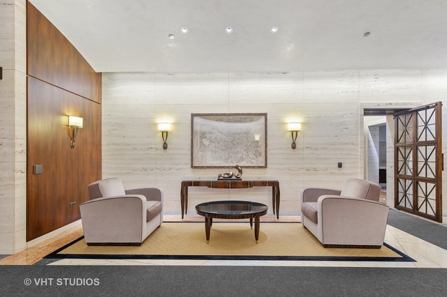 180 East Pearson Street, Unit 4002 Chicago, IL 60611 - Photo 35 of 40 a living room with furniture and a large window
