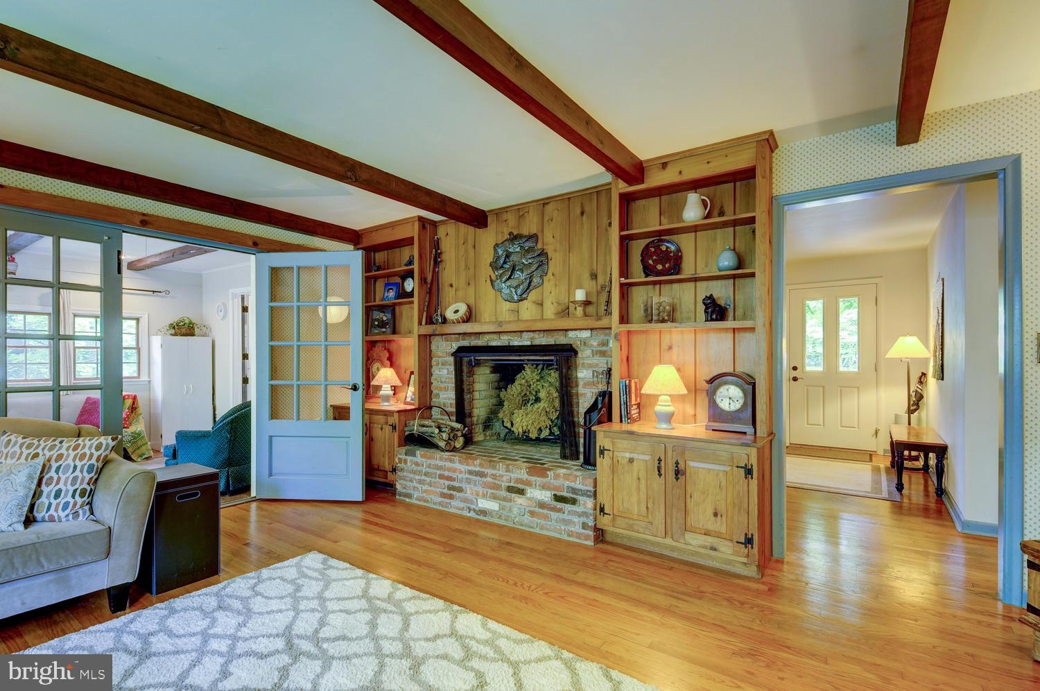 136 Cranbury Road Princeton Junction, NJ 08550 - Photo 15 of 40 Living Room with Fireplace & Built-in Shelves