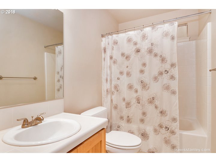 4636 Northwest Corazon Terrace Portland, OR 97229 - Photo 14 of 18 a bathroom with a sink and a mirror