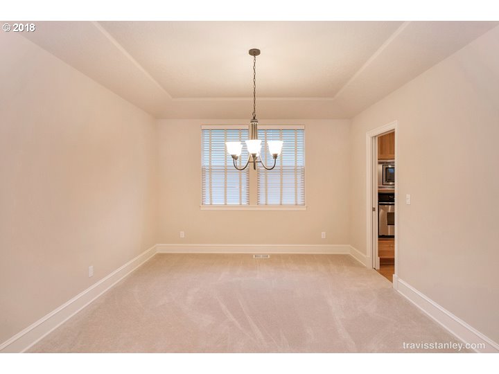 4636 Northwest Corazon Terrace Portland, OR 97229 - Photo 3 of 18 a view of a windows and chandelier in a room
