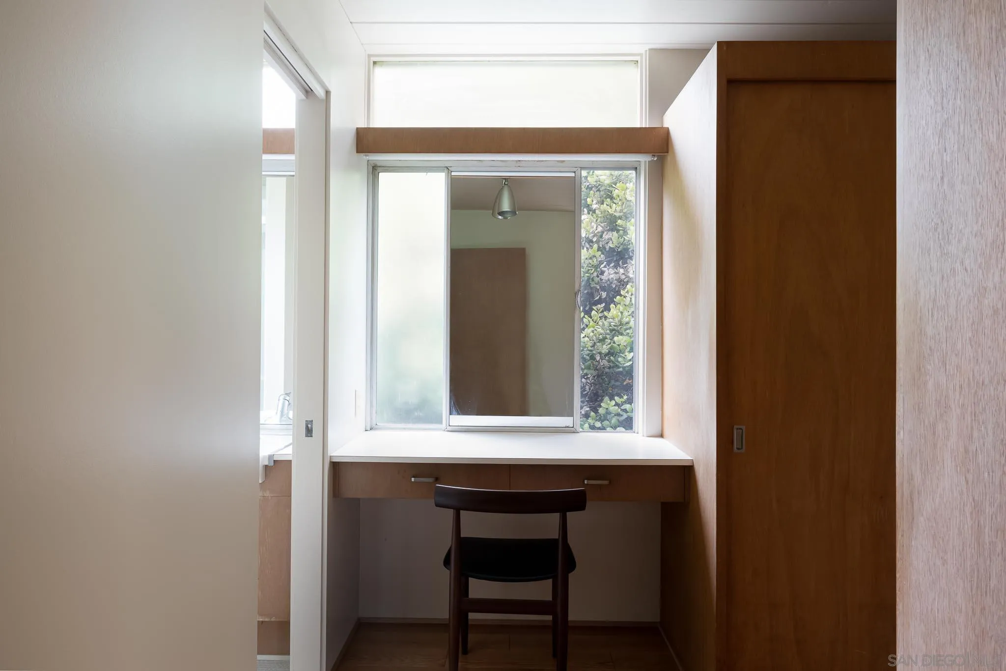 1945 Balboa Avenue Del Mar, CA 92014 - Photo 20 of 25 a view of a door and chair in a room