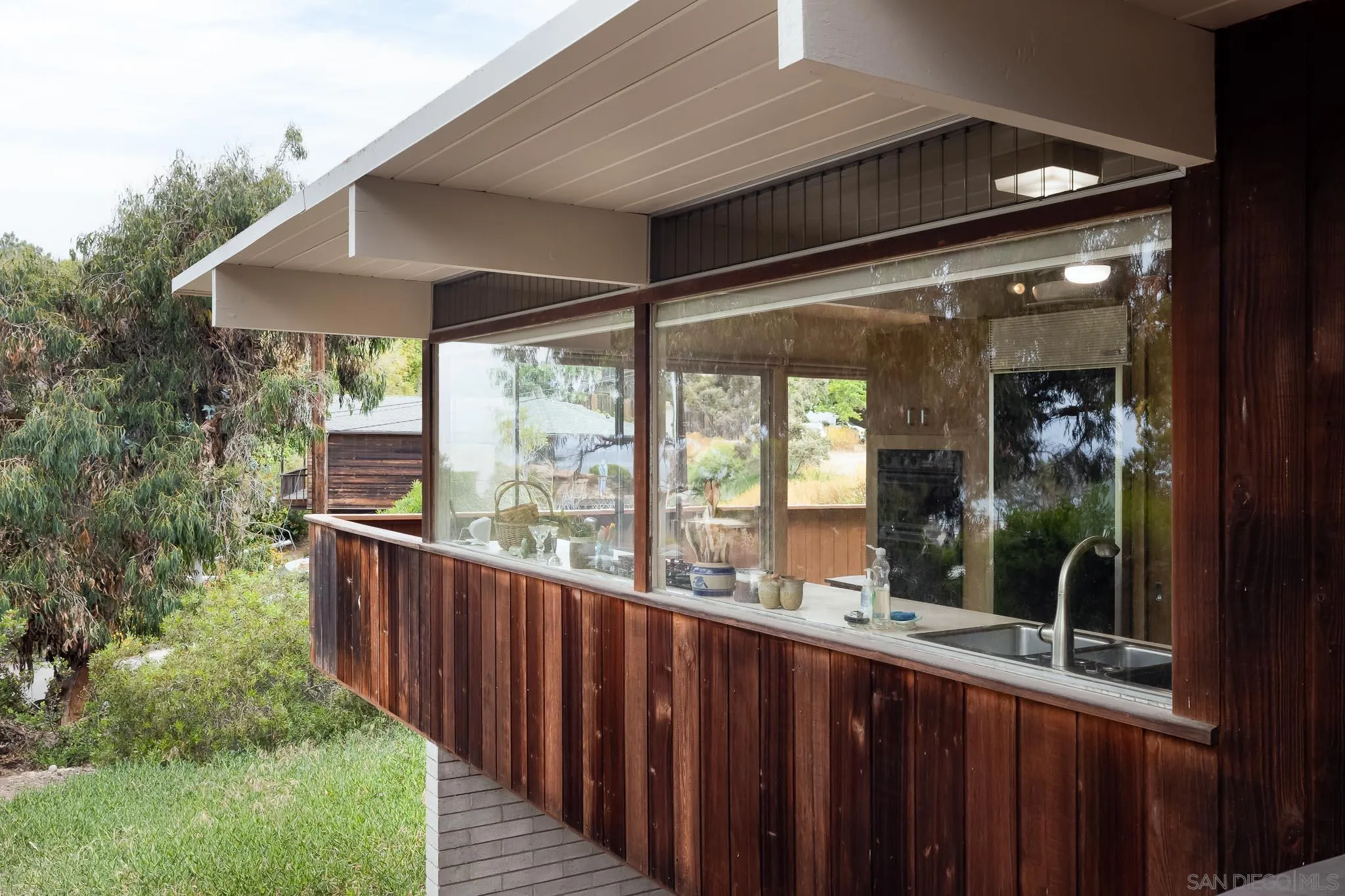 1945 Balboa Avenue Del Mar, CA 92014 - Photo 7 of 25 a view of a porch with furniture and yard