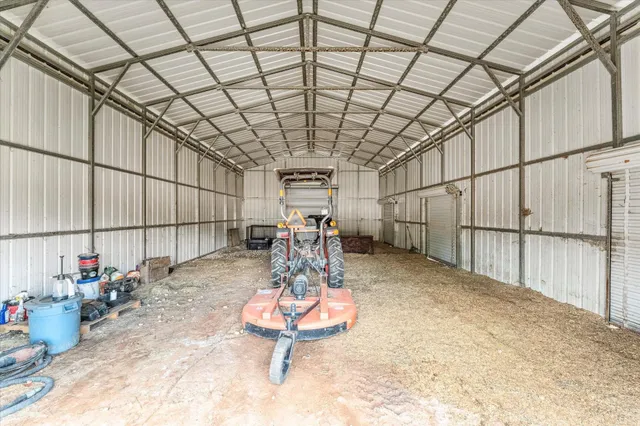 a room with lots of furniture and a chandelier