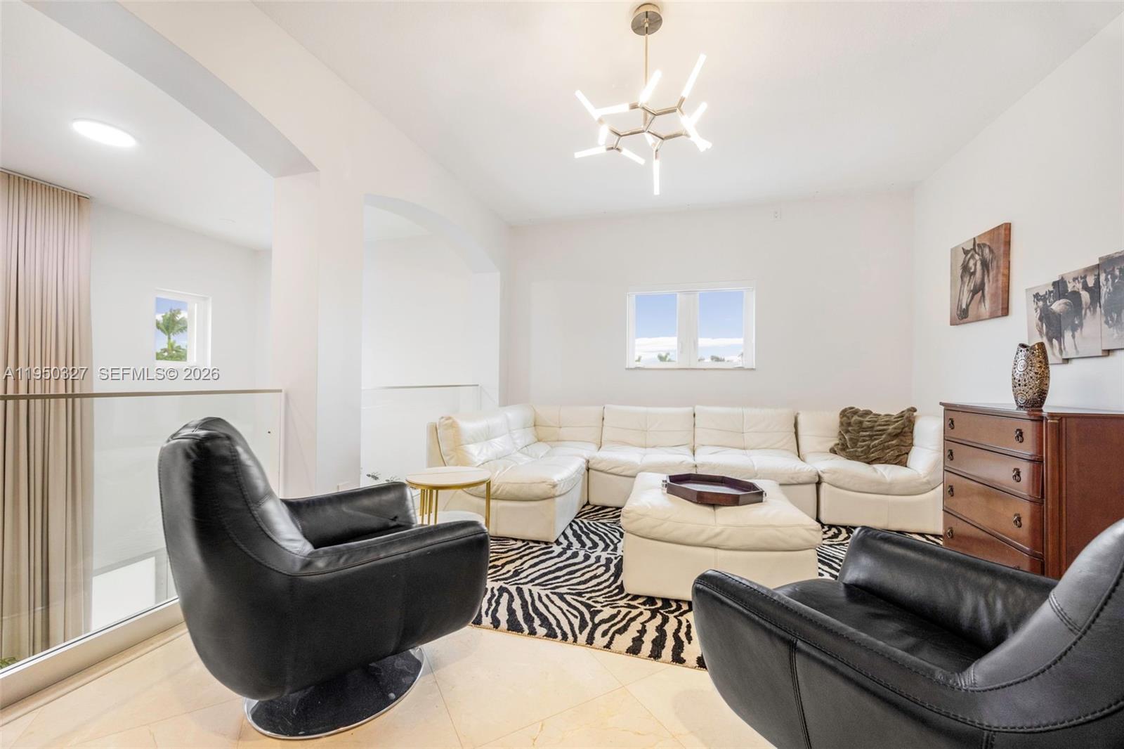 34650 Southwest 218th Avenue Homestead, FL 33034 - Photo 18 of 52 a living room with furniture