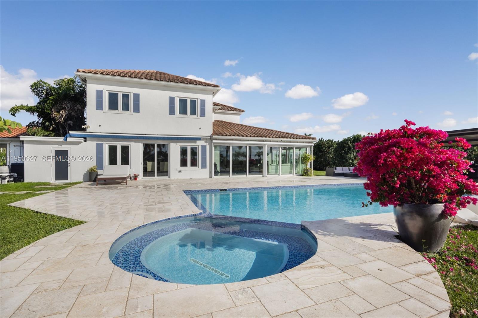 34650 Southwest 218th Avenue Homestead, FL 33034 - Photo 38 of 52 a front view of a house with a garden