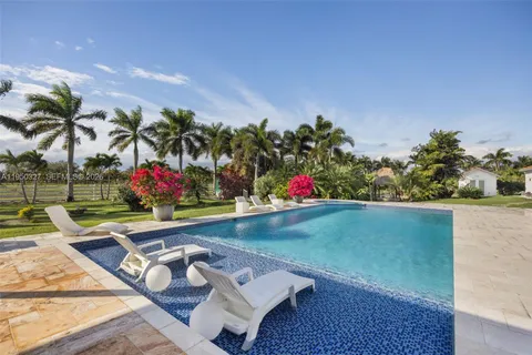 a view of yard from a patio