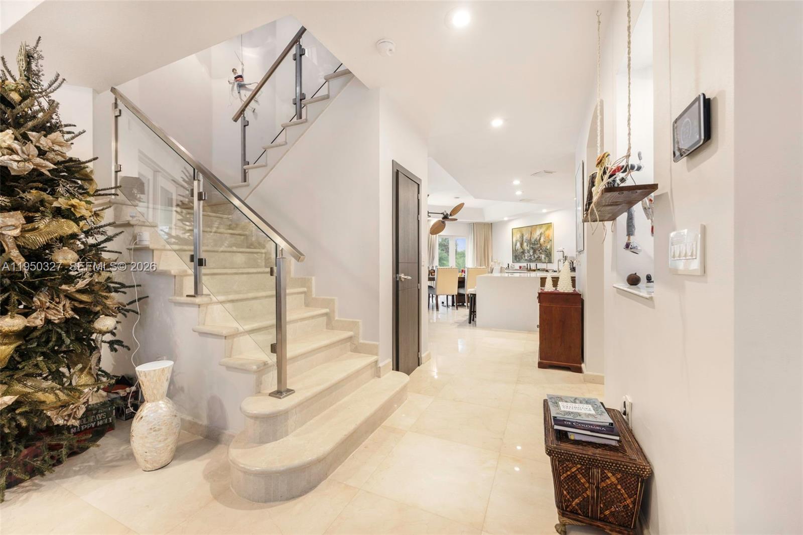 34650 Southwest 218th Avenue Homestead, FL 33034 - Photo 7 of 52 a view of entryway and hall with a living room