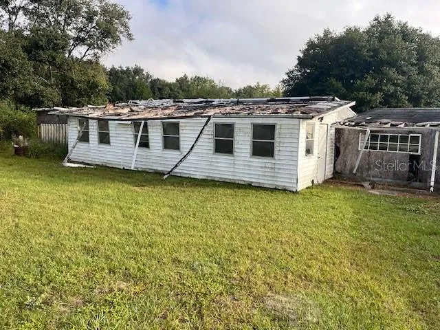 a view of a house with a swimming pool