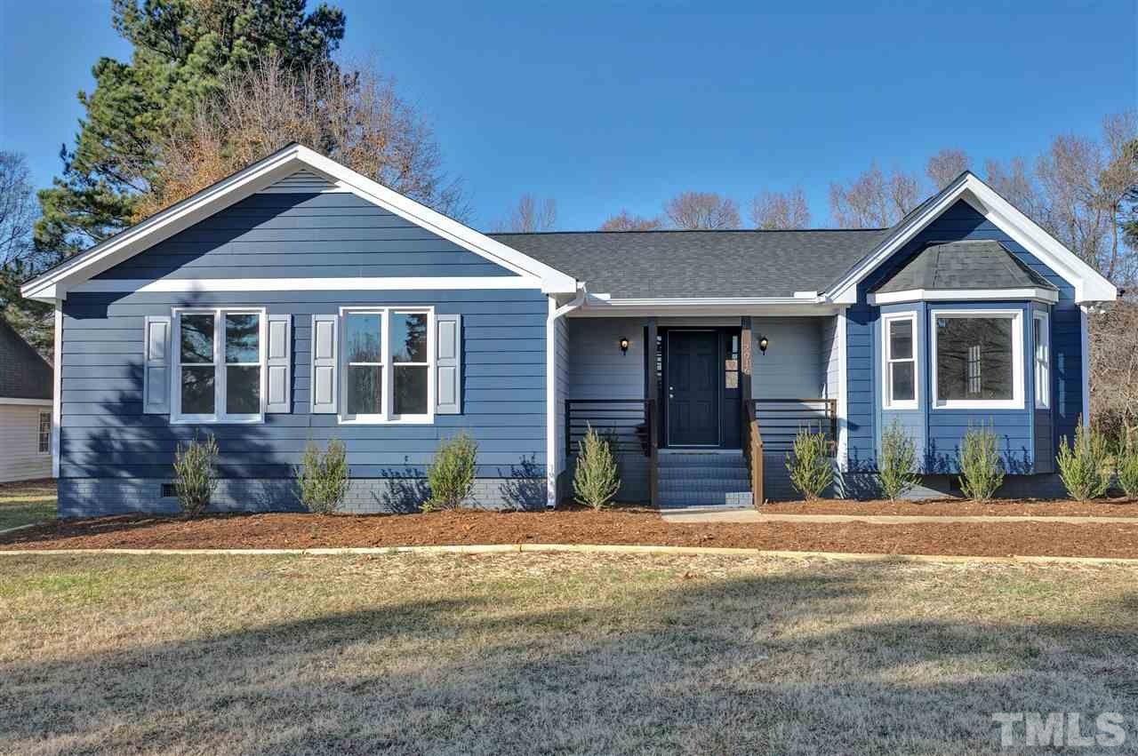 2016 Howson Road Raleigh, NC 27603 - Photo 1 of 25 a front view of a house with a yard