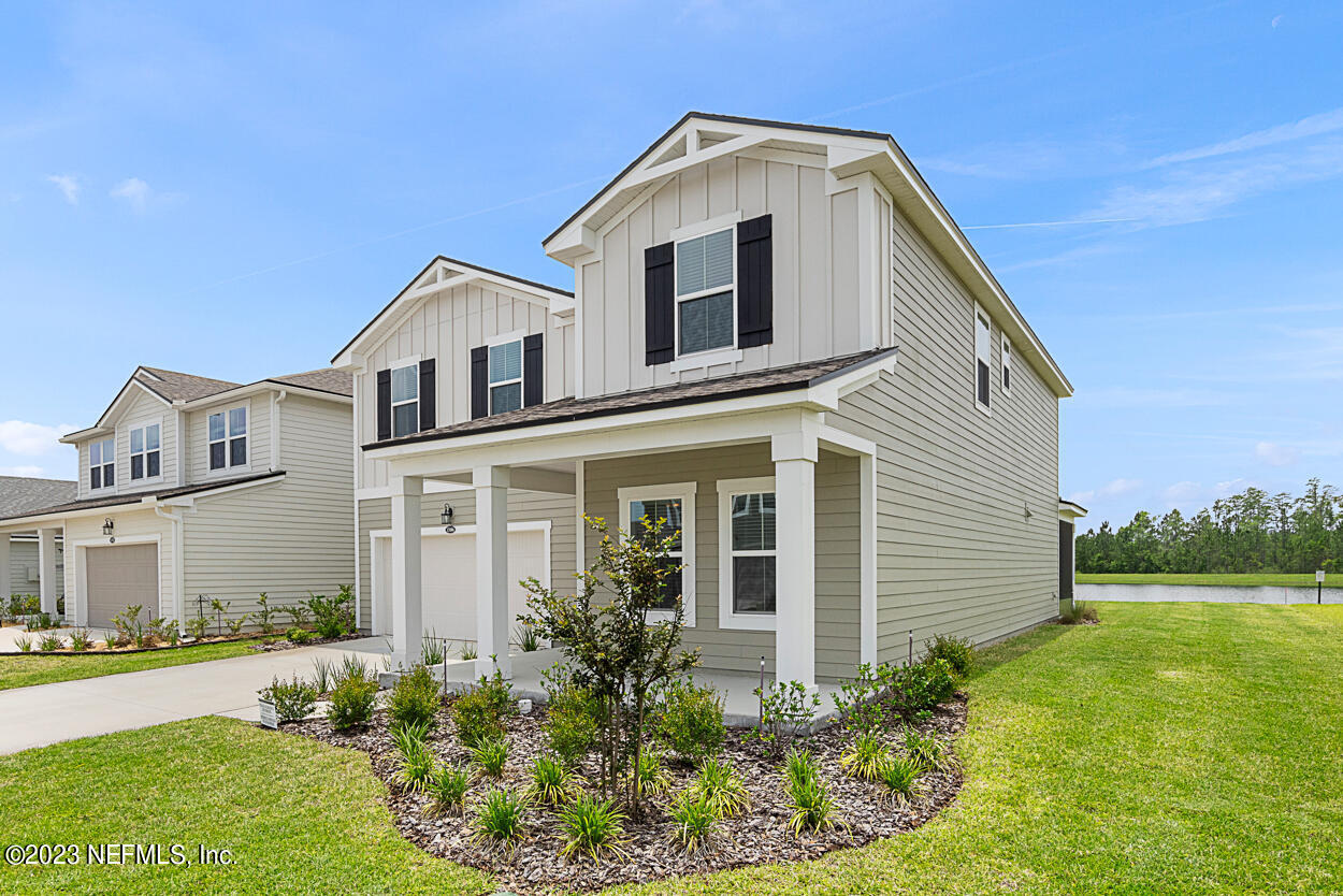 13186 Dunwick Road Jacksonville, FL 32256 - Photo 2 of 48 a front view of a house with garden