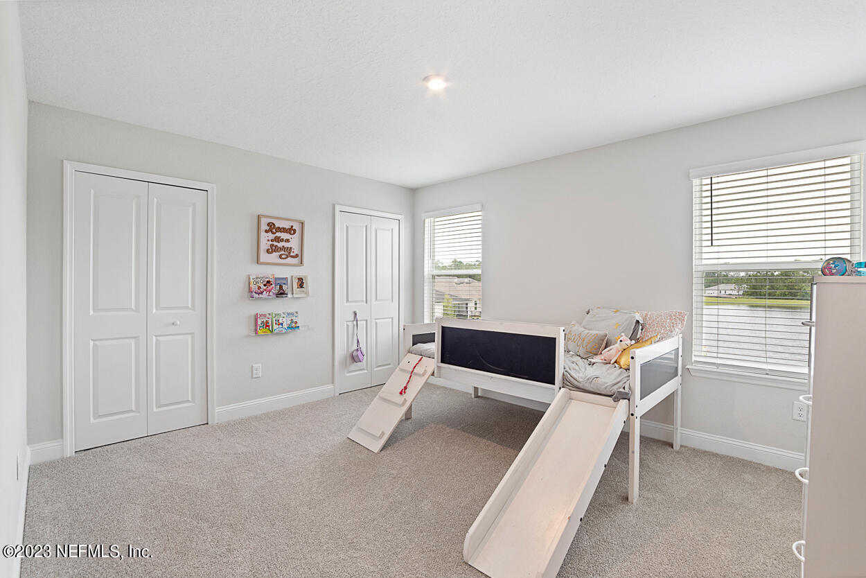 13186 Dunwick Road Jacksonville, FL 32256 - Photo 24 of 48 a living room with furniture and a window