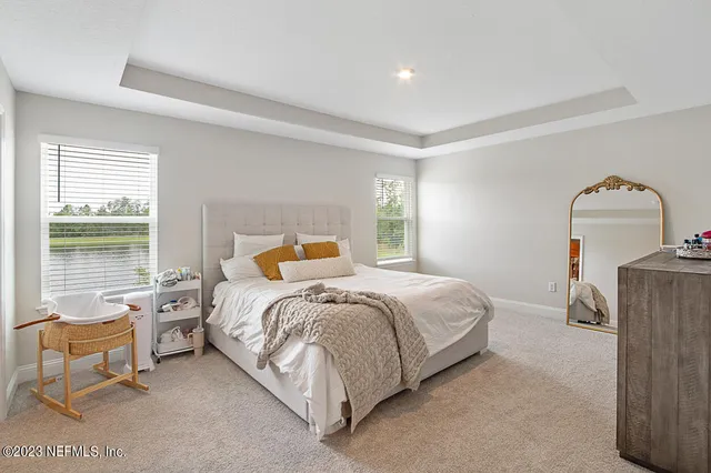 a bedroom with a bed and utility