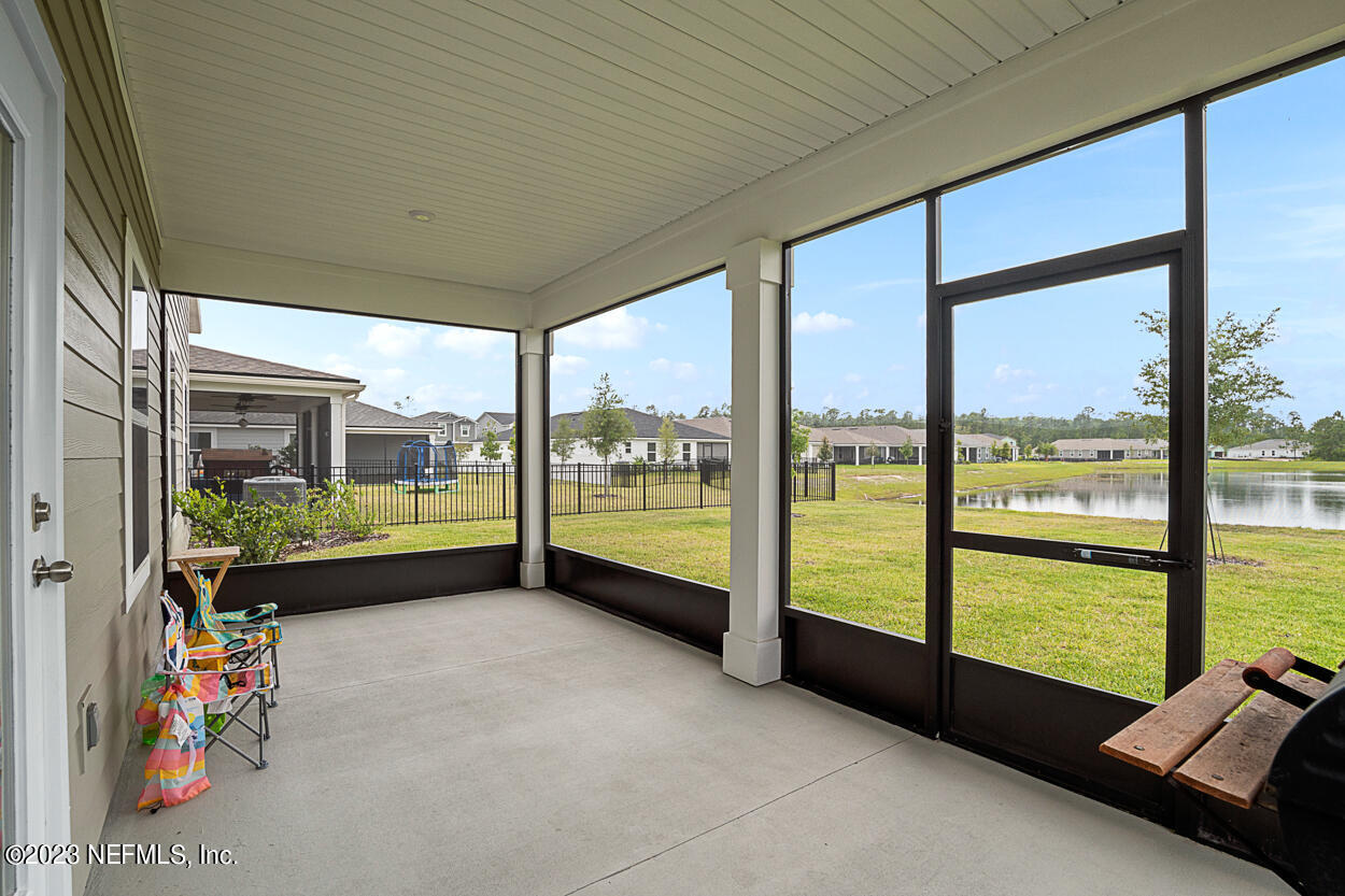 13186 Dunwick Road Jacksonville, FL 32256 - Photo 31 of 48 a room with pool table and large windows