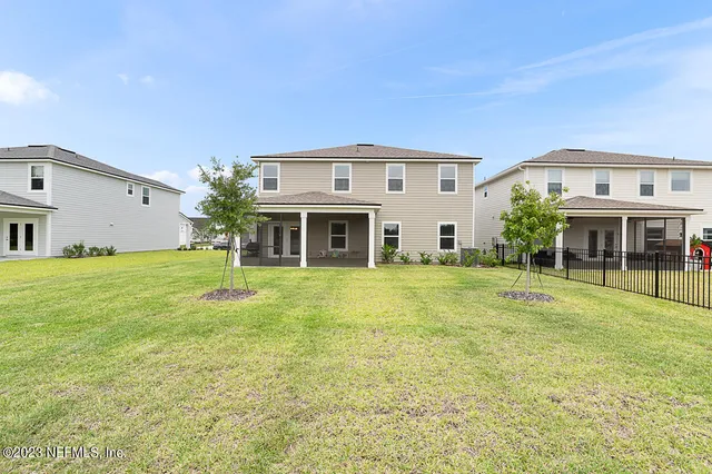 a view of a golf course with a lake