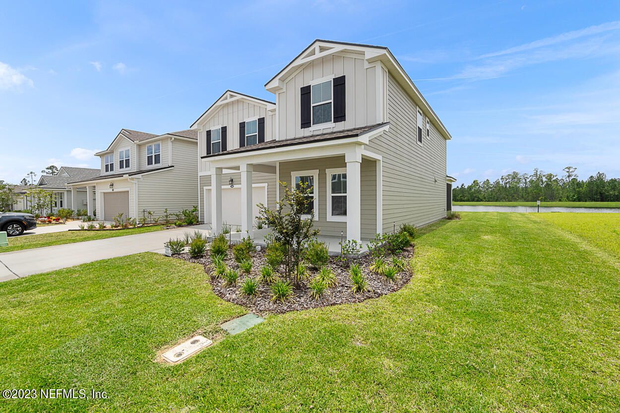 13186 Dunwick Road Jacksonville, FL 32256 - Photo 40 of 48 a front view of a house with a yard