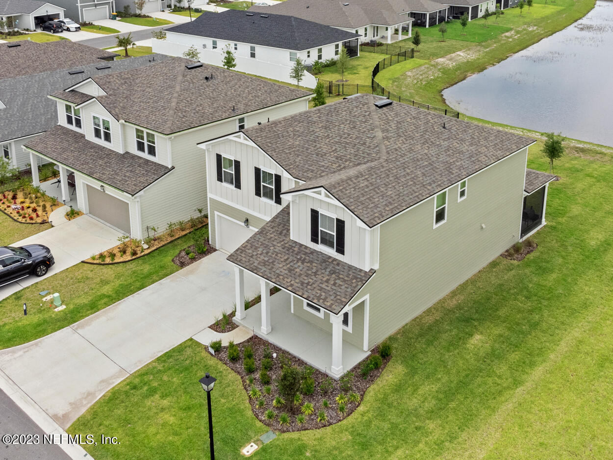 13186 Dunwick Road Jacksonville, FL 32256 - Photo 41 of 48 a aerial view of a house with a yard