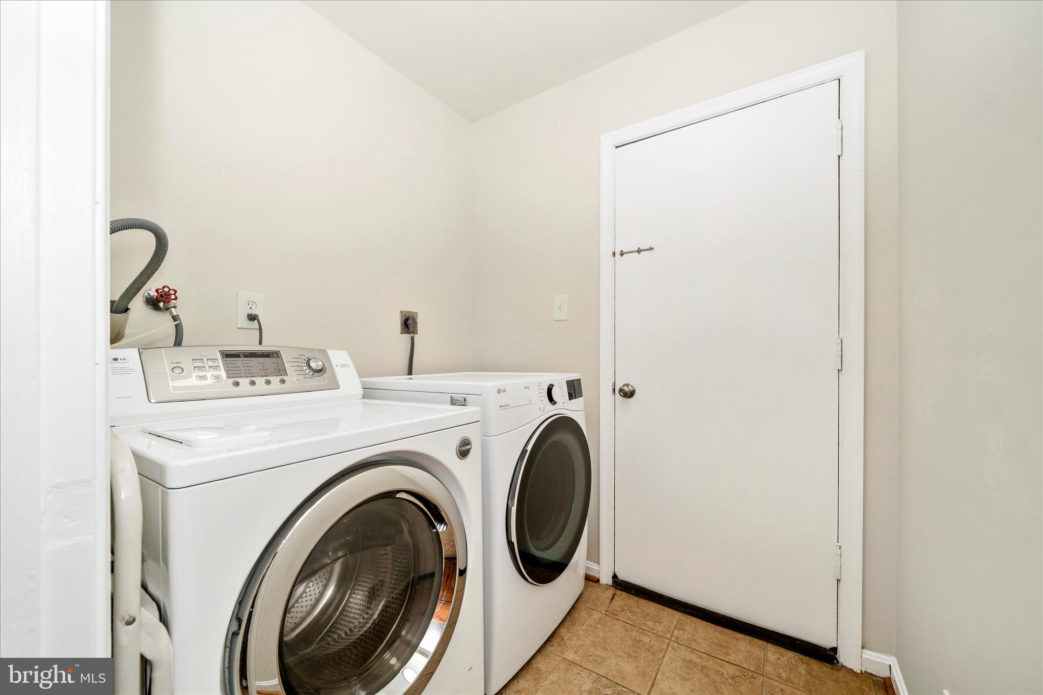 16000 Narrows Terrace Silver Spring, MD 20906 - Photo 21 of 54 a utility room with dryer and washer