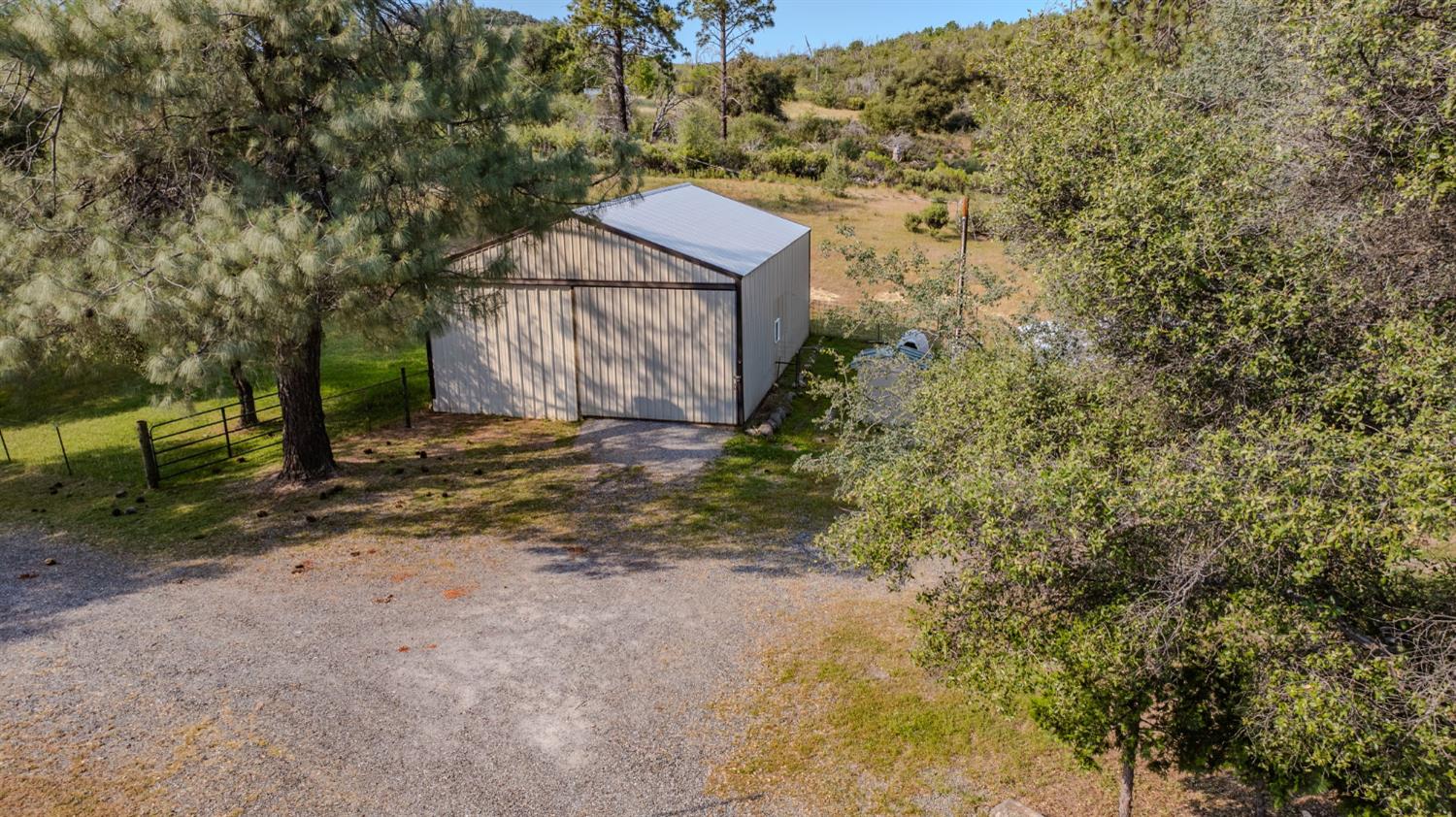 6216 Trout Lane Mountain Ranch, CA 95246 - Photo 3 of 39 a view of a house with a yard