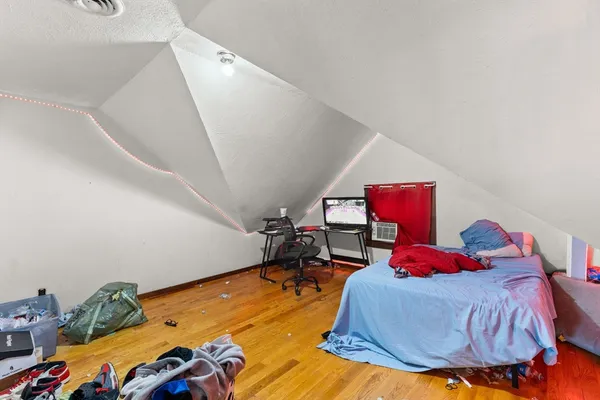 a bed room with a bed and a couch