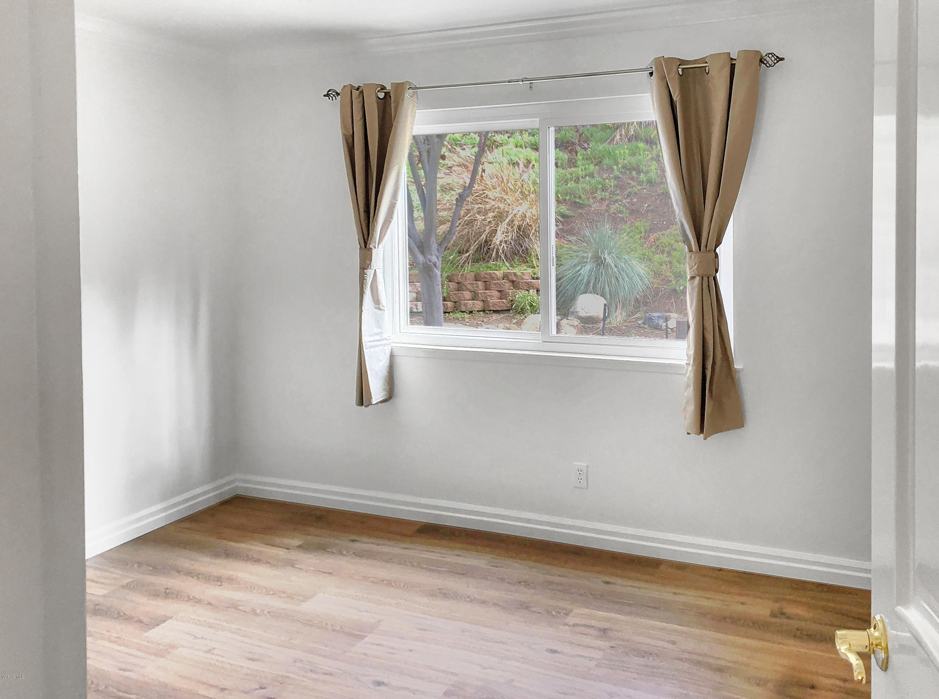 29407 Promontory Place Agoura Hills, CA 91301 - Photo 16 of 26 a view of a window in a room