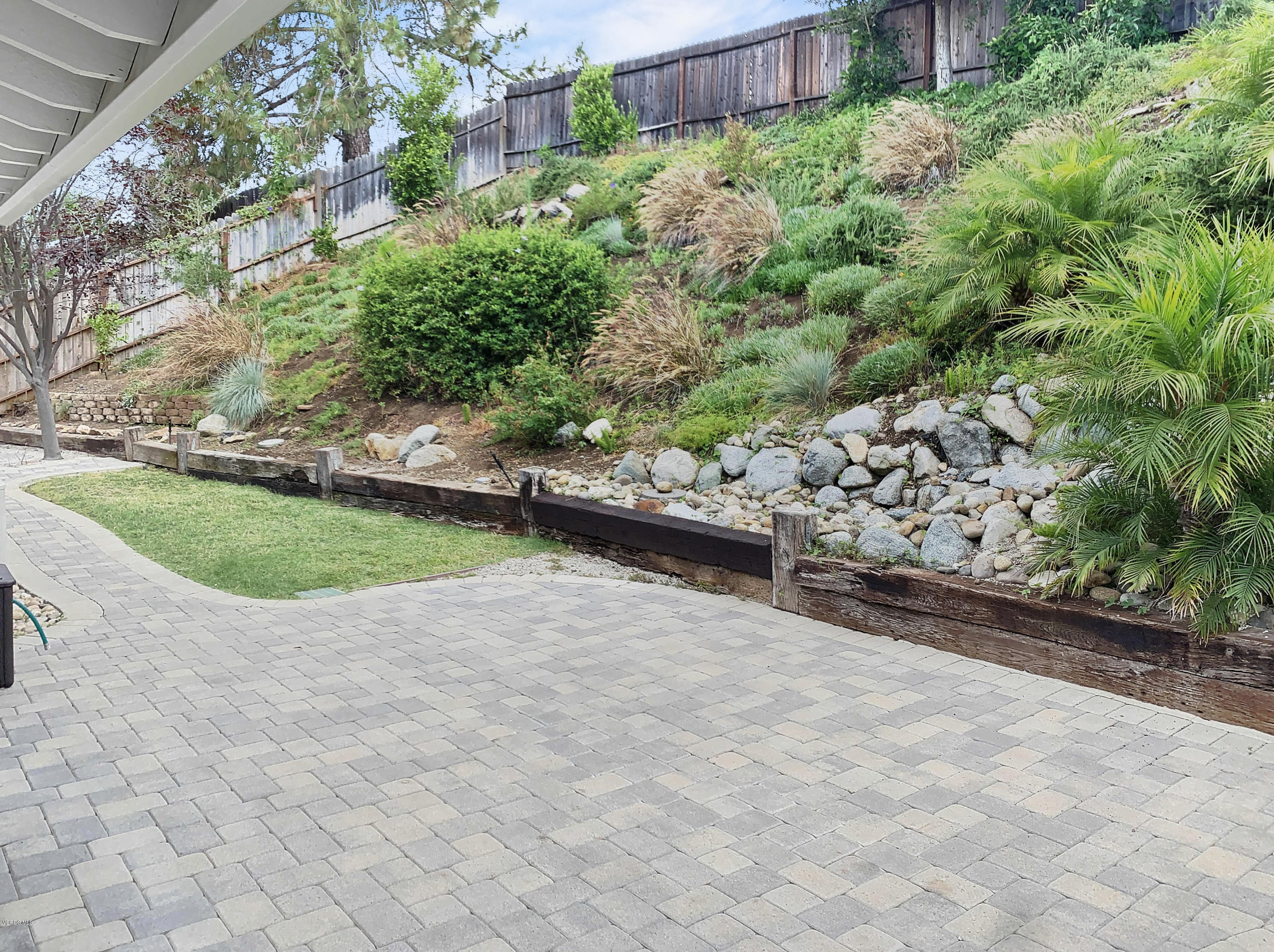 29407 Promontory Place Agoura Hills, CA 91301 - Photo 19 of 26 a view of a garden with flowers