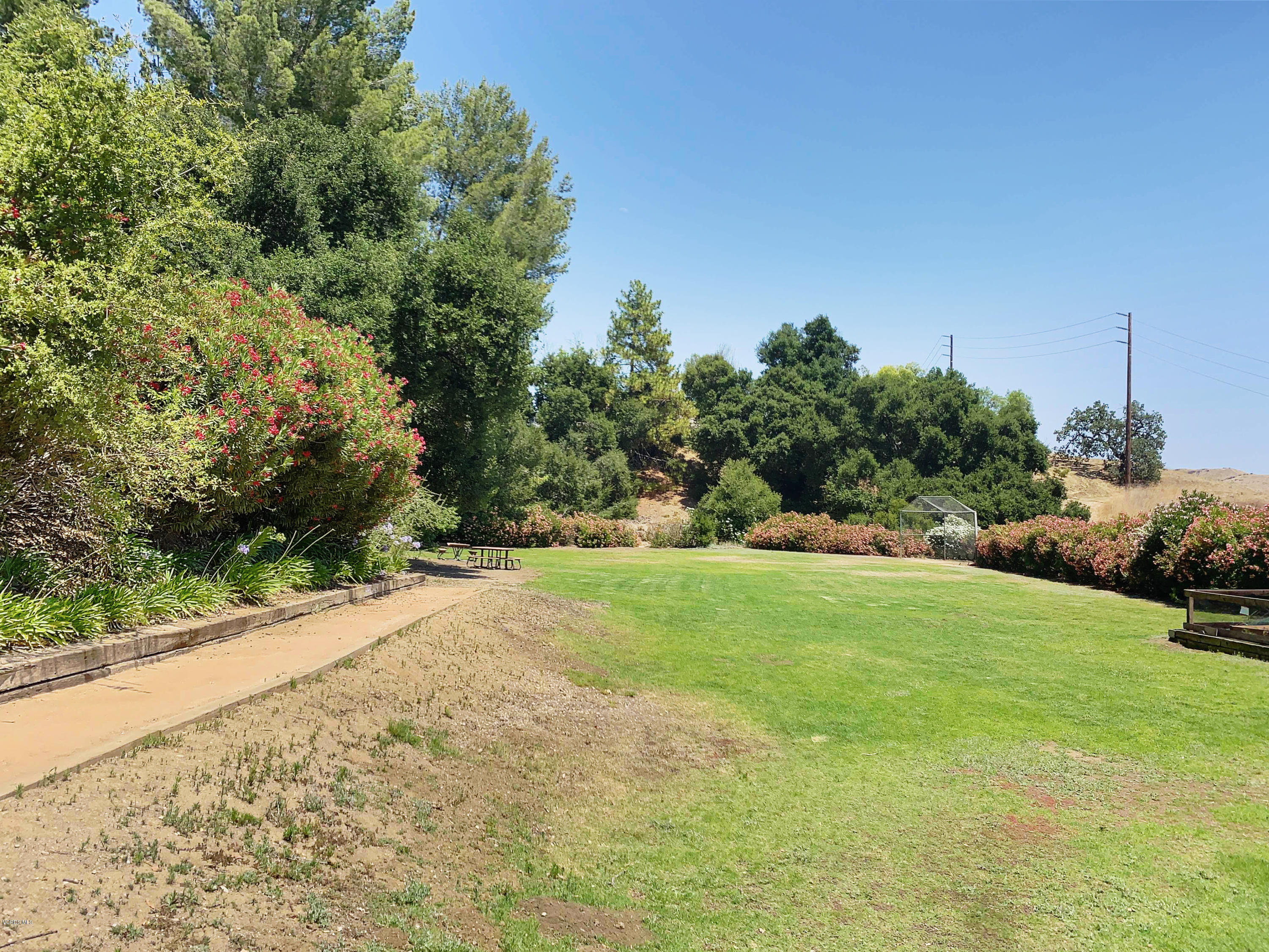 29407 Promontory Place Agoura Hills, CA 91301 - Photo 24 of 26 a view of a field of grass and trees