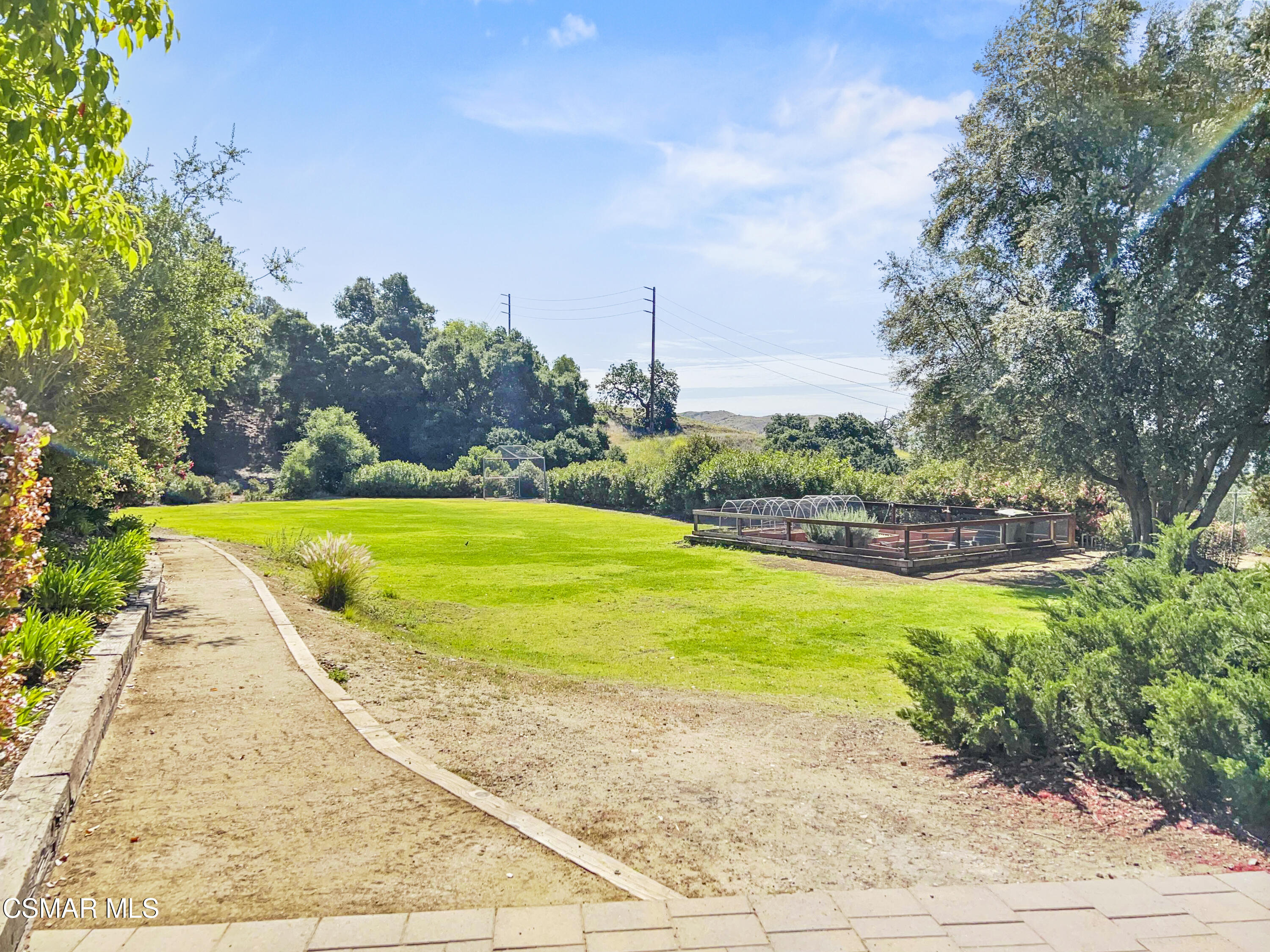 29407 Promontory Place Agoura Hills, CA 91301 - Photo 26 of 26 a view of a swimming pool with a yard