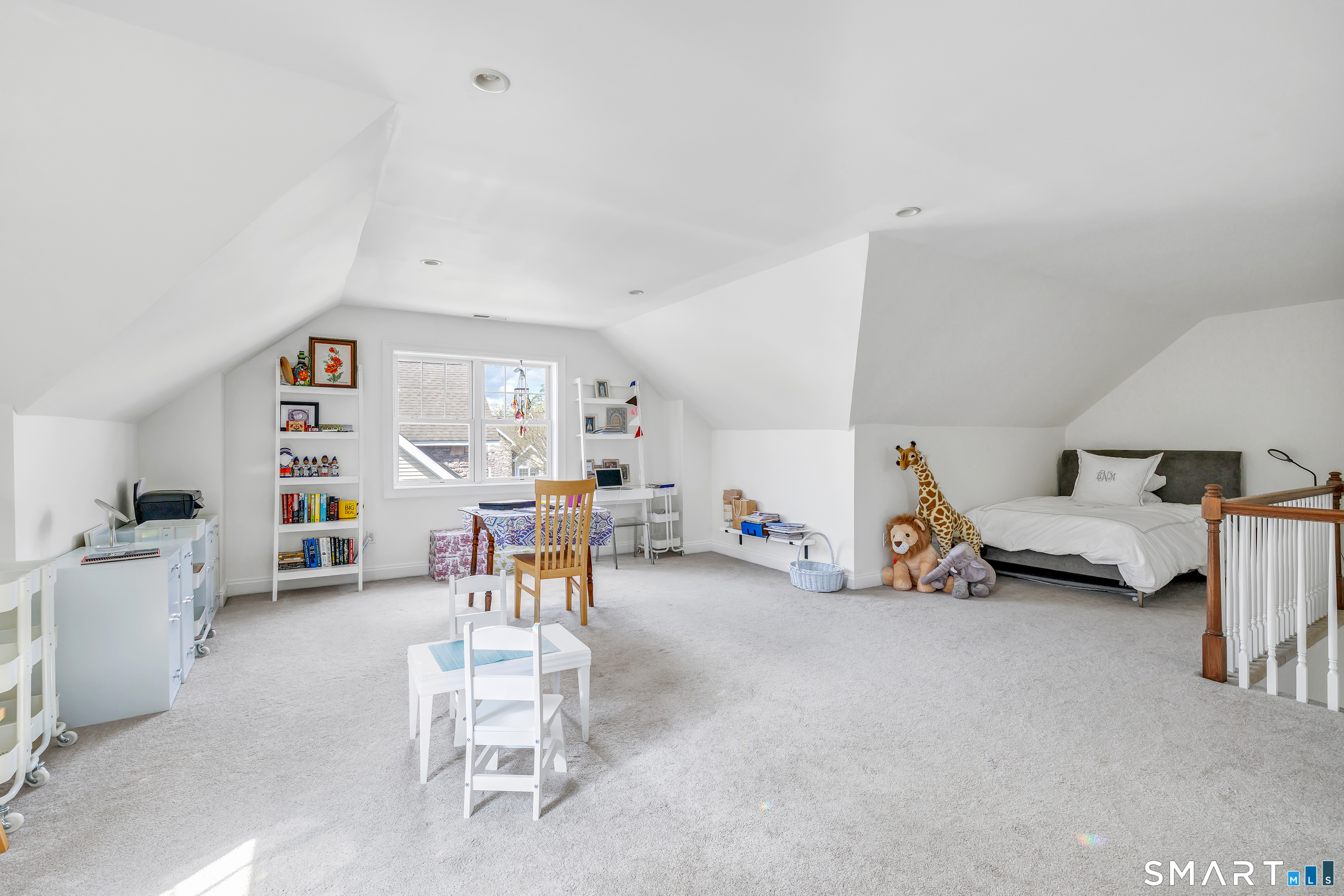 39 Maple Tree Avenue, Unit 15 Stamford, CT 06906 - Photo 20 of 32 a living room with furniture and white walls